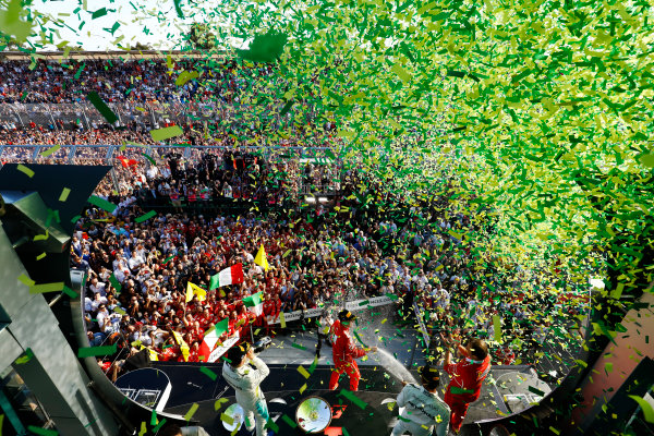 Albert Park, Melbourne, Australia.
Sunday 26 March 2017.
A burst of ticker tape covers the podium. Race winner Sebastian Vettel, Ferrari, 1st Position, celebrates with Luigi Fraboni, Head of Power Unit Race Operation, Ferrari. The pair are joined by Lewis Hamilton, Mercedes AMG, 2nd Position, and Valtteri Bottas, Mercedes AMG, 3rd Position.
World Copyright: Steven Tee/LAT Images
Ref: Digital Image _O3I3248