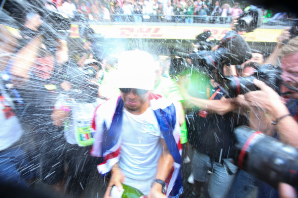 Autodromo Hermanos Rodriguez, Mexico City, Mexico.
Sunday 29 October 2017.
Lewis Hamilton, Mercedes AMG, sprays Champagne at photographers in celebration of securing his 4th world drivers championship title.
World Copyright: Charles Coates/LAT Images
ref: Digital Image DJ5R7725 Autodromo Hermanos Rodriguez, Mexico City, Mexico.
Sunday 29 October 2017.
Lewis Hamilton, Mercedes AMG, sprays Champagne at photographers in celebration of securing his 4th world drivers championship title.
World Copyright: Charles Coates/LAT Images
ref: Digital Image DJ5R7725