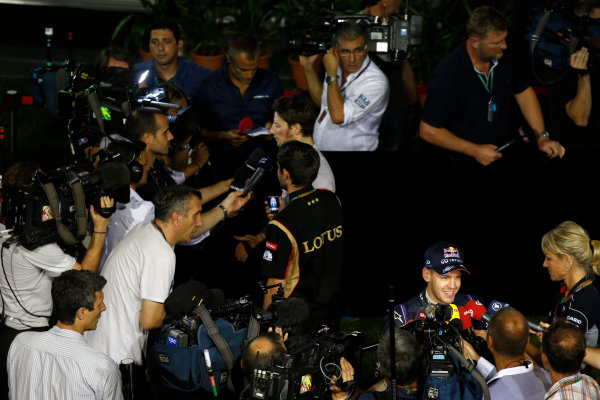 Marina Bay Circuit, Singapore.
Saturday 21st September 2013.
Sebastian Vettel, Red Bull Racing, and Romain Grosjean, Lotus F1, talk to the media after qualifying.
World Copyright: Charles Coates/LAT Photographic.
ref: Digital Image _N7T5481 Marina Bay Circuit, Singapore.
Saturday 21st September 2013.
Sebastian Vettel, Red Bull Racing, and Romain Grosjean, Lotus F1, talk to the media after qualifying.
World Copyright: Charles Coates/LAT Photographic.
ref: Digital Image _N7T5481
