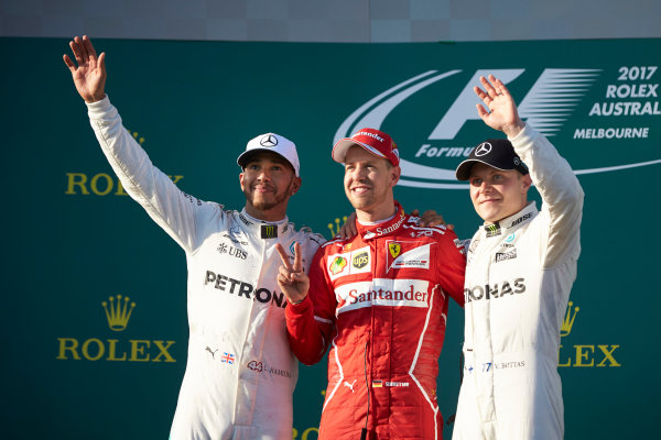 Albert Park, Melbourne, Australia.
Sunday 26 March 2017.
Lewis Hamilton, Mercedes AMG, 2nd Position, Sebastian Vettel, Ferrari, 1st Position, and Valtteri Bottas, Mercedes AMG, 3rd Position, on the podium.
World Copyright: Steve Etherington/LAT Images
ref: Digital Image SNE25428