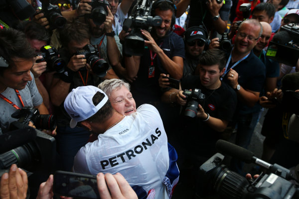 Autodromo Hermanos Rodriguez, Mexico City, Mexico.
Sunday 29 October 2017.
Lewis Hamilton, Mercedes AMG, celebrates with his mum Carmen Larbalestier, surrounded by photographers and media,after securing his 4th world drivers championship title, and third with Mercedes.
World Copyright: Charles Coates/LAT Images 
ref: Digital Image DJ5R7919