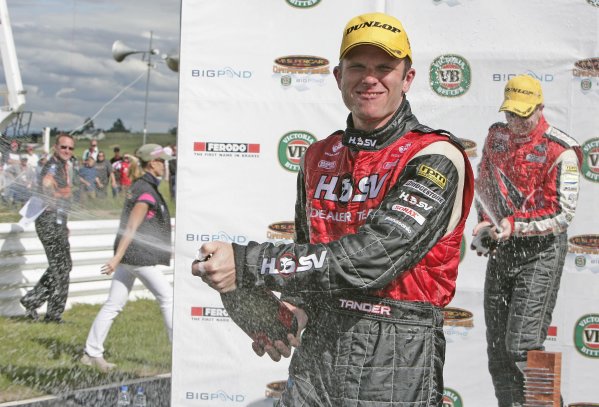 2005 Australian V8 Supercars
Symmons Plains Raceway, Australia. 11th - 13th November 2005
Race winner Garth Tander (HSV Dealer Team Holden Commodore VZ), sprays the champagne. Podium.
World Copyright: Mark Horsburgh / LAT Photographic
ref: 05AusV8SP44