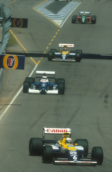 1990 Australian Grand Prix.
Adelaide, Australia.
2-4 November 1990.
Riccardo Patrese (Williams FW13B Renault) followed by Jean Alesi (Tyrrell 019 Ford), Thierry Boutsen (Williams FW13B Renault) Roberto Moreno (Benetton B190 Ford).
Ref-90 AUS 12.
World Copyright - LAT Photographic
1990 Australian Grand Prix.
Adelaide, Australia.
2-4 November 1990.
Riccardo Patrese (Williams FW13B Renault) followed by Jean Alesi (Tyrrell 019 Ford), Thierry Boutsen (Williams FW13B Renault) Roberto Moreno (Benetton B190 Ford).
Ref-90 AUS 12.
World Copyright - LAT Photographic
