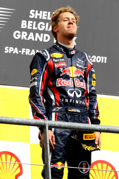 Spa-Francorchamps, Spa, Belgium
28th August 2011.
Sebastian Vettel, Red Bull Racing RB7 Renault, 1st position, on the podium. Portrait. Podium. 
World Copyright: Andy Hone/LAT Photographic
ref: Digital Image CI0C2432