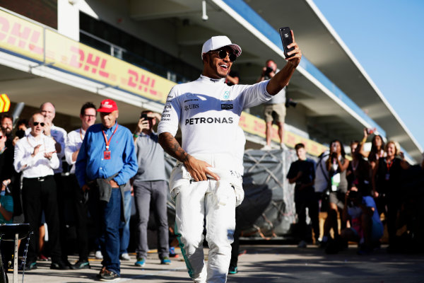 Circuit of the Americas, Austin, Texas, United States of America.
Sunday 22 October 2017.
Lewis Hamilton, Mercedes AMG, takes a selfie as he celebrates winning the Constructors’ Championship with his team.
World Copyright: Zak Mauger/LAT Images
ref: Digital Image _56I3738 Circuit of the Americas, Austin, Texas, United States of America.
Sunday 22 October 2017.
Lewis Hamilton, Mercedes AMG, takes a selfie as he celebrates winning the Constructors’ Championship with his team.
World Copyright: Zak Mauger/LAT Images
ref: Digital Image _56I3738
