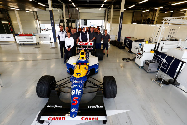 Williams 40 Event
Silverstone, Northants, UK
Friday 2 June 2017.
A group photo next to the Williams FW14B Renault. Dickie Stanford sits on the right rear wheel, and Jonathan Williams stands behind the rear wing.
World Copyright: Sam Bloxham/LAT Images
ref: Digital Image _W6I6813