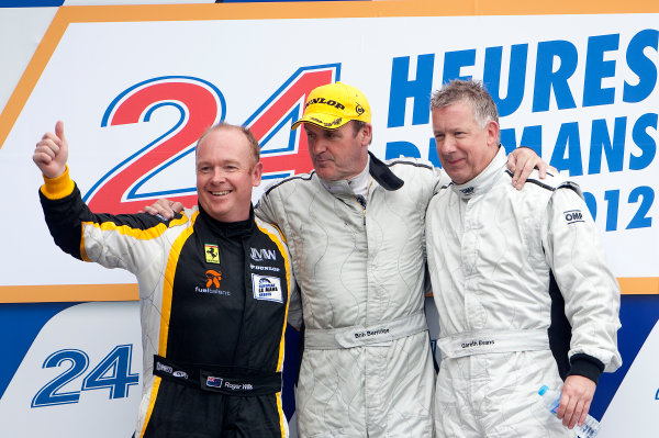 Circuit de La Sarthe, Le Mans, France. 13th - 17th June 2012.
Group C.
Bob Berridge, No.31 Mercedes C11, 1st position, Roger Wills, No.5 Lancia LC2, 2nd position, and Gareth Evans, No.62 Sauber Mercedes C9, 3rd position, on the podium.
Photo: Daniel Kalisz/LAT Photographic.
ref: Digital Image IMG_8288 Circuit de La Sarthe, Le Mans, France. 13th - 17th June 2012.
Group C.
Bob Berridge, No.31 Mercedes C11, 1st position, Roger Wills, No.5 Lancia LC2, 2nd position, and Gareth Evans, No.62 Sauber Mercedes C9, 3rd position, on the podium.
Photo: Daniel Kalisz/LAT Photographic.
ref: Digital Image IMG_8288