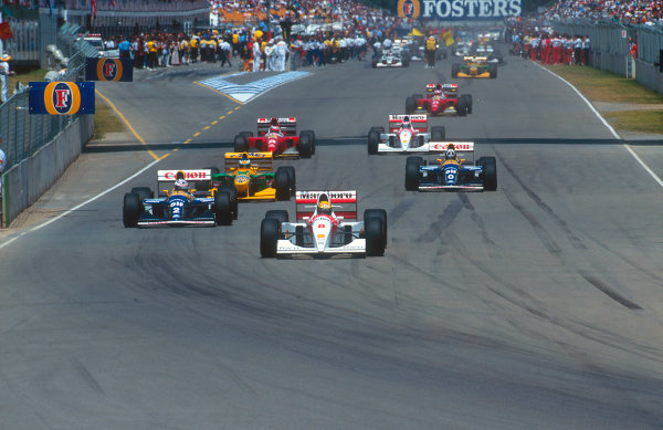 1993 Australian Grand Prix.
Adelaide, Australia.
5-7 November 1993.
Ayrton Senna (McLaren MP4/8 Ford) leads Alain Prost (Williams FW15C Renault), Michael Schumacher (Benetton B193B Ford), Damon Hill (Williams FW15C Renault), Gerhard Berger (Ferrari F93A), Mika Hakkinen (McLaren MP4/8 Ford) and Jean Alesi (Ferrari F93A) on the parade lap.
Ref-93 AUS 03.
World Copyright - LAT Photographic
1993 Australian Grand Prix.
Adelaide, Australia.
5-7 November 1993.
Ayrton Senna (McLaren MP4/8 Ford) leads Alain Prost (Williams FW15C Renault), Michael Schumacher (Benetton B193B Ford), Damon Hill (Williams FW15C Renault), Gerhard Berger (Ferrari F93A), Mika Hakkinen (McLaren MP4/8 Ford) and Jean Alesi (Ferrari F93A) on the parade lap.
Ref-93 AUS 03.
World Copyright - LAT Photographic