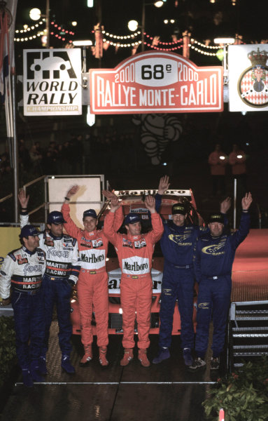 WRC Monte Carlo 2000
Tommi Makinen celebrates victory with 2nd place Carlos Sainz and 3rd place Juna Kankunnen.
Photo: McKlein/LAT
Tel: +44 (0)181 251 3000
Fax: +44 (0)181 251 3001
Somerset House, Somerset Road, Teddington, Middlesex, 
United Kingdon. TW11 8RU