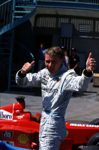 1999 Canadian Grand Prix.
Montreal, Quebec, Canada.
11-13 June 1999.
Mika Hakkinen (McLaren Mercedes) celebrates his 1st position in parc ferme.
Ref-99 CAN 01.
World Copyright - LAT Photographic



