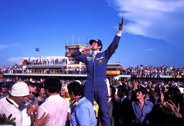 Jody Scheckter (RSA) celebrates a historic victory in the opening race of the season, as the Wolf team he drove for became the first and only constructor to win on their GP debut.
Argentinean Grand Prix, Rd1, Buenos Aires No. 15, Argentina, 9 January 1977.
BEST IMAGE
