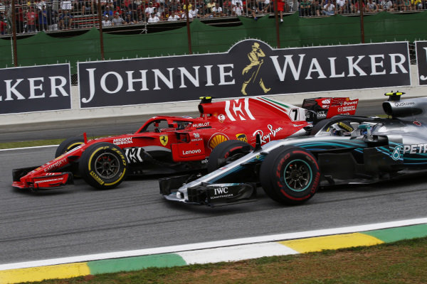 Kimi Raikkonen, Ferrari SF71H and Valtteri Bottas, Mercedes-AMG F1 W09 EQ Power+ battle