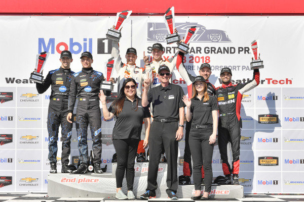 #54 CORE autosport ORECA LMP2, P: Jon Bennett, Colin Braun celebrates the win on the podium with #10 Wayne Taylor Racing Cadillac DPi, P: Renger van der Zande, Jordan Taylor, #31 Action Express Racing Cadillac DPi, P: Eric Curran, Felipe Nasr, and Mobil 1 guests