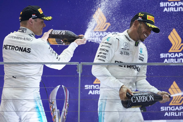 Marina Bay Circuit, Marina Bay, Singapore.
Sunday 17 September 2017.
Valtteri Bottas, Mercedes AMG, 3rd Position, sprays Lewis Hamilton, Mercedes AMG, 1st Position, with Champagne on the podium.
World Copyright: Steve Etherington/LAT Images
ref: Digital Image SNE17320 Marina Bay Circuit, Marina Bay, Singapore.
Sunday 17 September 2017.
Valtteri Bottas, Mercedes AMG, 3rd Position, sprays Lewis Hamilton, Mercedes AMG, 1st Position, with Champagne on the podium.
World Copyright: Steve Etherington/LAT Images
ref: Digital Image SNE17320