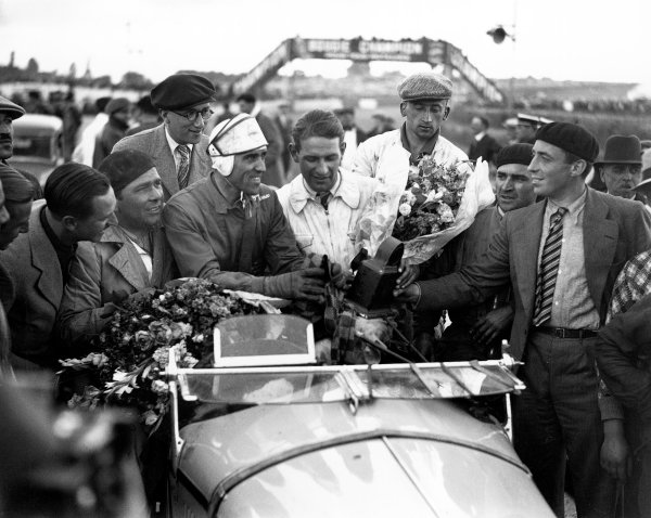 1933 Le Mans 24 hours.
Le Mans, France.
17-18 June 1933.
Tazio Nuvolari and Raymond Sommer (Alfa Romeo 8C) take the spoils for their 1st position.
A Race Through Time exhibition number 27.
World Copyright - LAT Photographic
Ref: C867
1933 Le Mans 24 hours.
Le Mans, France.
17-18 June 1933.
Tazio Nuvolari and Raymond Sommer (Alfa Romeo 8C) take the spoils for their 1st position.
A Race Through Time exhibition number 27.
World Copyright - LAT Photographic
Ref: C867