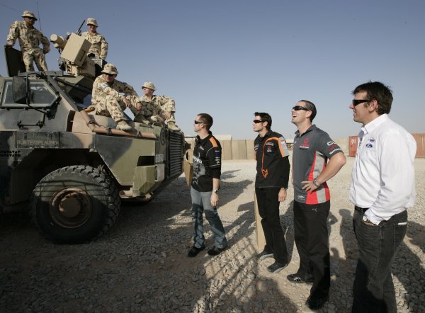 2007 Australian V8 Supercars.
Bahrain International Circuit. Sakhir, Bahrain.
2nd - 4th November.
Craig Lowndes, Jason Bright, Rick Kelly,Greg Murphy talk to the troops after flying into visit the Australian troops based at Tallil Airbase located approximately 310 kilometers Southeast of Baghdad, Iraq.
World Copyright: Mark Horsburgh/LAT Photographic.
Ref: Digital Image V8-Drivers-IRAQ-7302 2007 Australian V8 Supercars.
Bahrain International Circuit. Sakhir, Bahrain.
2nd - 4th November.
Craig Lowndes, Jason Bright, Rick Kelly,Greg Murphy talk to the troops after flying into visit the Australian troops based at Tallil Airbase located approximately 310 kilometers Southeast of Baghdad, Iraq.
World Copyright: Mark Horsburgh/LAT Photographic.
Ref: Digital Image V8-Drivers-IRAQ-7302