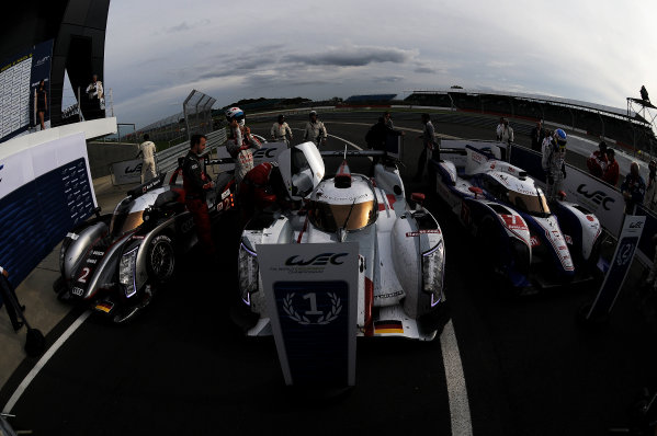 Silverstone, England. 24th - 26th August 2012. Rd 4.
Tom Kristensen (DNK), Allan McNish (GBR), Audi Sport Team Joest, Audi R18 Ultra, Andre Lotterer (GER), Marcel Fassler (CHE), Benoit Treluyer (FRA), Audi Sport Team Joest, Audi R18 E-Tron Quatrro, Alexander Wurz (AUT), Nicolas Lapierre (FRA), Kazuki Nakajima (JPN), Toyota Racing, Toyota TS030 Hybrid, in pard ferme, portrait, atmosphere, 
World Copyright: Chris Bird/LAT Photographic.
Ref:  _CJB8505