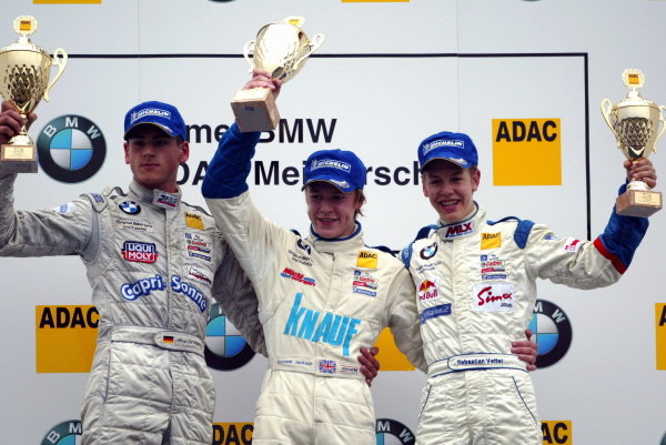 Round 19 podium and results:
1st Sutton Motorsport Images sponsored driver Dominik Jackson (GBR), Mucke Motorsport, centre.
2nd Adrian Sutil (GER), HBR Motorsport GmbH, left,
3rd Sebastian Vettel (GER), Eifelland Racing, right. Formula BMW ADAC Championship, Rd 19, Hockenheim, Germany. 4 October 2003.
DIGITAL IMAGE Round 19 podium and results:
1st Sutton Motorsport Images sponsored driver Dominik Jackson (GBR), Mucke Motorsport, centre.
2nd Adrian Sutil (GER), HBR Motorsport GmbH, left,
3rd Sebastian Vettel (GER), Eifelland Racing, right. Formula BMW ADAC Championship, Rd 19, Hockenheim, Germany. 4 October 2003.
DIGITAL IMAGE