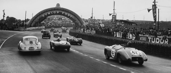 Le Mans, France. 23rd - 24th June 1951
R to L: Bert Hadley/Charles Goodacre (#42 Jowett Jupiter), retired, follows Pierre Veyron/Georges Monneret (#37 Simca Gordini), retired, Auguste Veuillet/Edmond Mouche (#46 Porsche 356/4), 20th position and Richard Stoop/Peter S. Wilson (#34 Frazer Nash RLM), 19th position, at the start, action. World Copyright: LAT Photographic
Ref: B/W Print Le Mans, France. 23rd - 24th June 1951
R to L: Bert Hadley/Charles Goodacre (#42 Jowett Jupiter), retired, follows Pierre Veyron/Georges Monneret (#37 Simca Gordini), retired, Auguste Veuillet/Edmond Mouche (#46 Porsche 356/4), 20th position and Richard Stoop/Peter S. Wilson (#34 Frazer Nash RLM), 19th position, at the start, action. World Copyright: LAT Photographic
Ref: B/W Print