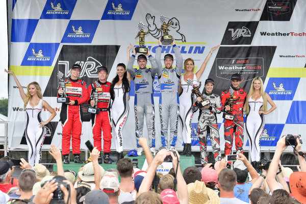 #14 3GT Racing Lexus RCF GT3, GTD: Dominik Baumann, Kyle Marcelli, #58 Wright Motorsports Porsche 911 GT3 R, GTD: Patrick Long, Christina Nielsen, #86 Michael Shank Racing with Curb-Agajanian Acura NSX, GTD: Katherine Legge, Mario Farnbacher, celebrate the win on the podium #14 3GT Racing Lexus RCF GT3, GTD: Dominik Baumann, Kyle Marcelli, #58 Wright Motorsports Porsche 911 GT3 R, GTD: Patrick Long, Christina Nielsen, #86 Michael Shank Racing with Curb-Agajanian Acura NSX, GTD: Katherine Legge, Mario Farnbacher, celebrate the win on the podium