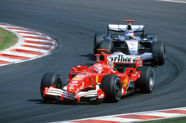 2005 Hungarian Grand Prix. Hungaroring, Hungary. 29th - 31st July 2005
Michael Schumacher, Ferrari F2005 leads Kimi Raikkonen, McLaren Mercedes MP4-20. Action. World Copyright: Michael Cooper/LAT Photographic Ref: 35mm Image A06