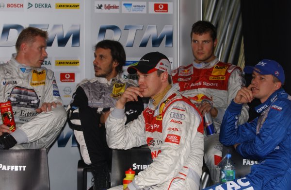 2005 DTM Championship
Hockenheim, Germany. 21st - 23rd October 2005.
Mika Hakkinen (AMG-Mercedes C-Klasse), Laurent Aiello (Opel Vectra GTS V8), Martin Tomczyk (Abt Sportsline Audi A4), Marcel Fassler (Opel Vecrta GTS V8) and Frank Stippler (Joest Racing Audi A4) in the driver's briefing.
World Copyright: Andre Irlmeier/LAT Photographic
ref: Digital Image Only