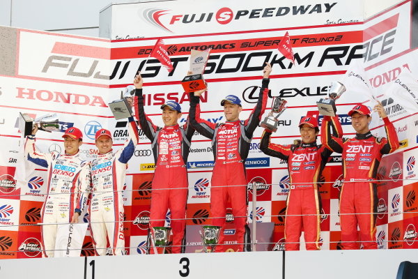 GT500 winners Tsugio Matsuda & Ronnie Quintarelli, who shared the number 23 Motel Autech NISMO Nissan GT-R, celebrate on the podium. The second position duo of Heikki Kovalainen & Sho Tsuboi, Denso Kobelco SARD Lexus LC500 also raise their trophies, along with third placed drivers Yuji Tachikawa & Hiroaki Ishiura, Zent Cerumo Lexus LC500. GT500 winners Tsugio Matsuda & Ronnie Quintarelli, who shared the number 23 Motel Autech NISMO Nissan GT-R, celebrate on the podium. The second position duo of Heikki Kovalainen & Sho Tsuboi, Denso Kobelco SARD Lexus LC500 also raise their trophies, along with third placed drivers Yuji Tachikawa & Hiroaki Ishiura, Zent Cerumo Lexus LC500.