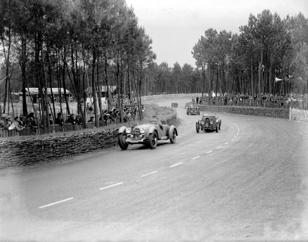 Le Mans, France. 15-16 June 1935.
Daniel Porthault/Just Emile Vernet (Lorraine-Dietrich B3-6) leads Pierre Merlin/Georges d'Arnoux (Bugatti T55), Raymond Sommer/Raymond de Sauge (Alfa Romeo 8C) and Joan Richmond/Mrs Gordon Simpson (MG Midget PA).
Ref-Motor 800/96.
World Copyright - LAT Photographic Le Mans, France. 15-16 June 1935.
Daniel Porthault/Just Emile Vernet (Lorraine-Dietrich B3-6) leads Pierre Merlin/Georges d'Arnoux (Bugatti T55), Raymond Sommer/Raymond de Sauge (Alfa Romeo 8C) and Joan Richmond/Mrs Gordon Simpson (MG Midget PA).
Ref-Motor 800/96.
World Copyright - LAT Photographic