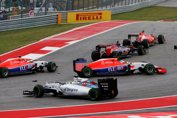 Circuit of the Americas, Austin, Texas, United States of America. 
Sunday 25 October 2015.
Alexander Rossi, Manor Marussia MR03 Ferrari, and Will Stevens, Manor Marussia MR03 Ferrari, take action to avoid Felipe Massa, Williams FW37 Mercedes, as he recovers from a spin.
World Copyright: Glenn Dunbar/LAT Photographic
ref: Digital Image _W2Q4817
