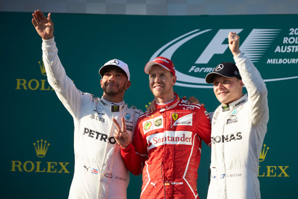 Albert Park, Melbourne, Australia.
Sunday 26 March 2017.
Lewis Hamilton, Mercedes AMG, 2nd Position, Sebastian Vettel, Ferrari, 1st Position, and Valtteri Bottas, Mercedes AMG, 3rd Position, on the podium.
World Copyright: Steve Etherington/LAT Images
ref: Digital Image SNE25432