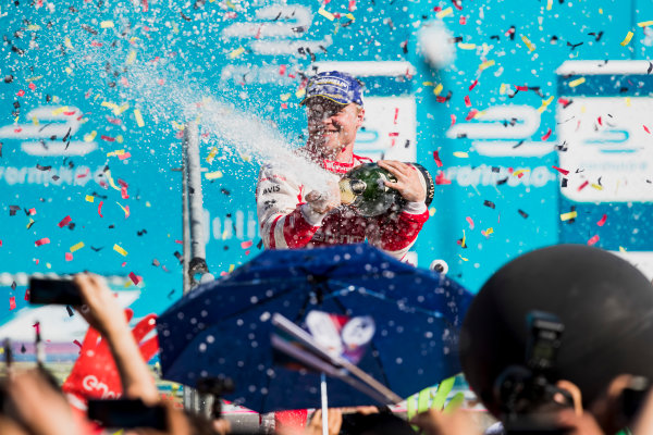 2016/2017 FIA Formula E Championship.
Round 7 - Berlin ePrix, Tempelhof Airport, Berlin, Germany.
Saturday 10 June 2017.
Felix Rosenqvist (SWE), Mahindra Racing, Spark-Mahindra, Mahindra M3ELECTRO, sprays the champagne on the podium.
Photo: Zak Mauger/LAT/Formula E
ref: Digital Image _54I7715