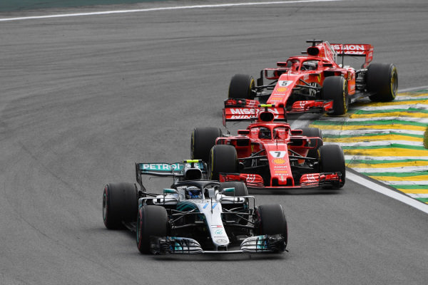Valtteri Bottas, Mercedes-AMG F1 W09 EQ Power+ leads Kimi Raikkonen, Ferrari SF71H and Sebastian Vettel, Ferrari SF71H
