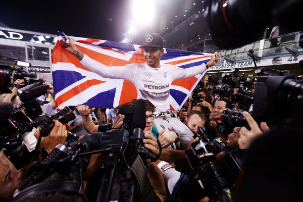 Yas Marina Circuit, Abu Dhabi, United Arab Emirates.
Sunday 23 November 2014. 
Lewis Hamilton, Mercedes AMG, celebrates championship victory. 
World Copyright: Steve Etherington/LAT Photographic.
ref: Digital Image SNE13424