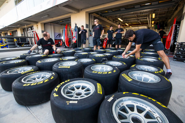 2017 FIA Formula 2 Round 11.
Yas Marina Circuit, Abu Dhabi, United Arab Emirates.
Thursday 23 November 2017.
ART Grand Prix mechanics prepare Pirelli tyres 
Photo: Sam Bloxham/FIA Formula 2.
ref: Digital Image _W6I1656