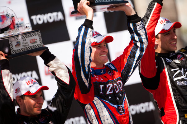 Long Beach. California, USA. 16th - 18th April 2010. 
Ryan Hunter - Reay, (Andretti Autosport) celebrates victory on the podium with Justin Wilson, (Dreyer and Reinbold Racing) and Will Power, (Verizon Team Penske). 
Portrait.  
World Copyright: Drew Gibson/LAT Photographic. 
Digital Image _Y2Z2551