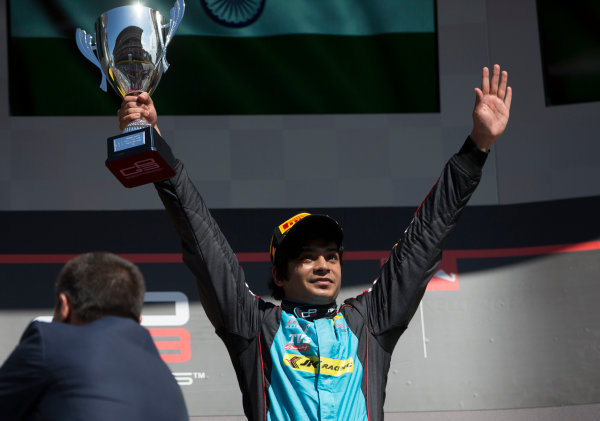 2017 GP3 Series Round 1. 
Circuit de Catalunya, Barcelona, Spain.
Sunday 14 May 2017.
Arjun Maini (IND, Jenzer Motorsport) celebrates his victory on the podium after winning Race Two
Photo: Jed Leicester/GP3 Series Media Service.
ref: Digital Image JL1_0152