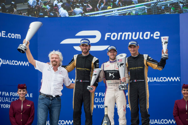 2016/2017 FIA Formula E Championship.
Round 9 - New York City ePrix, Brooklyn, New York, USA.
Saturday 15 July 2017.
Sr Richard Branson, Sam Bird (GBR), DS Virgin Racing, Spark-Citroen, Virgin DSV-02, Jean-Eric Vergne (FRA), Techeetah, Spark-Renault, Renault Z.E 16, and Stephane Sarrazin (FRA), Techeetah, Spark-Renault, Renault Z.E 16, celebrate on the podium.
Photo: Andrew Ferraro/LAT/Formula E
ref: Digital Image _FER8687