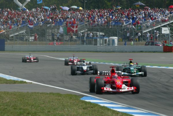 Michael Schumacher (GER) Ferrari F2003-GA suffered a puncture late in the race that dropped him from second to seventh position, and opened up the World Championship again.
Formula One World Championship, Rd12, German Grand Prix, Race Day, Hockenheim, Germany, 3 August 2003.
DIGITAL IMAGE Michael Schumacher (GER) Ferrari F2003-GA suffered a puncture late in the race that dropped him from second to seventh position, and opened up the World Championship again.
Formula One World Championship, Rd12, German Grand Prix, Race Day, Hockenheim, Germany, 3 August 2003.
DIGITAL IMAGE