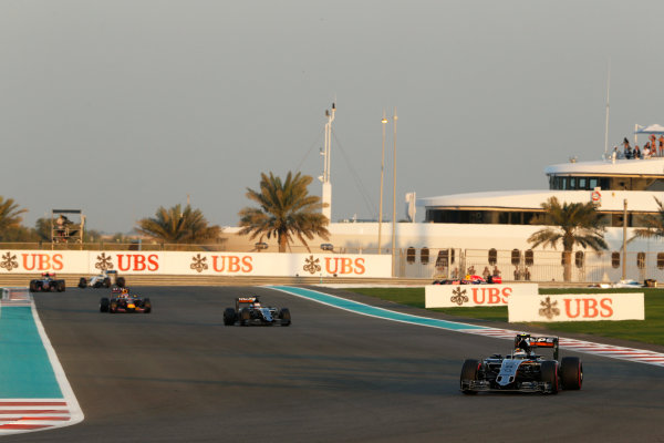 Yas Marina Circuit, Abu Dhabi, United Arab Emirates.
Sunday 29 November 2015.
Sergio Perez, Force India VJM08 Mercedes, leads Nico Hulkenberg, Force India VJM08 Mercedes, and Daniel Ricciardo, Red Bull Racing RB11 Renault.
World Copyright: Charles Coates/LAT Photographic
ref: Digital Image _99O1882