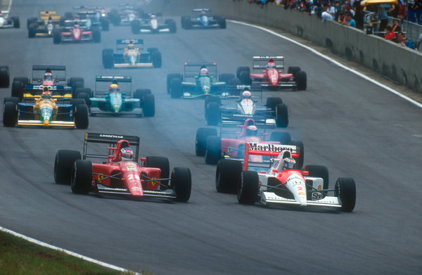 1991 Brazilian Grand Prix.
Interlagos, Sao Paulo, Brazil.
22-24 March 1991.
Gerhard Berger (McLaren MP4/6 Honda) followed by Jean Alesi and Alain Prost (Ferrari 642), Nelson Piquet (Benetton B190B Ford), Stefano Modena (Tyrrell 020 Honda), Mauricio Gugelmin (Leyton House CG911 Ilmor), Eric Bernard (Lola L91 Ford), Bertrand Gachot (Jordan 191 Ford) and Emanuele Pirro (Dallara 191 Judd) at the start.
Ref-91 BRA 11.
World Copyright - LAT Photographic
1991 Brazilian Grand Prix.
Interlagos, Sao Paulo, Brazil.
22-24 March 1991.
Gerhard Berger (McLaren MP4/6 Honda) followed by Jean Alesi and Alain Prost (Ferrari 642), Nelson Piquet (Benetton B190B Ford), Stefano Modena (Tyrrell 020 Honda), Mauricio Gugelmin (Leyton House CG911 Ilmor), Eric Bernard (Lola L91 Ford), Bertrand Gachot (Jordan 191 Ford) and Emanuele Pirro (Dallara 191 Judd) at the start.
Ref-91 BRA 11.
World Copyright - LAT Photographic