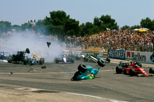 Paul Ricard, France.
7-9 July 1989.
Mauricio Gugelmin (March CG891 Judd) has a huge crash on the start of the race at Epingle Ecole. Rene Arnoux (Ligier JS33 Ford) flies up after crashing into Jonathan Palmer (Tyrrell 018 Ford) as well.
Ref-89 FRA 09.
World Copyright - LAT Photographic Paul Ricard, France.
7-9 July 1989.
Mauricio Gugelmin (March CG891 Judd) has a huge crash on the start of the race at Epingle Ecole. Rene Arnoux (Ligier JS33 Ford) flies up after crashing into Jonathan Palmer (Tyrrell 018 Ford) as well.
Ref-89 FRA 09.
World Copyright - LAT Photographic