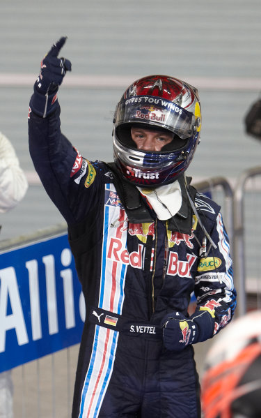 Yas Marina Circuit, Abu Dhabi, United Arab Emirates
1st November 2009.
Sebastian Vettel, Red Bull Racing RB5 Renault, 1st position, and celebrates in Parc Ferme. Portrait. Helmets. Finish.
World Copyright: Steve Etherington/LAT Photographic
ref: Digital Image SNE17903